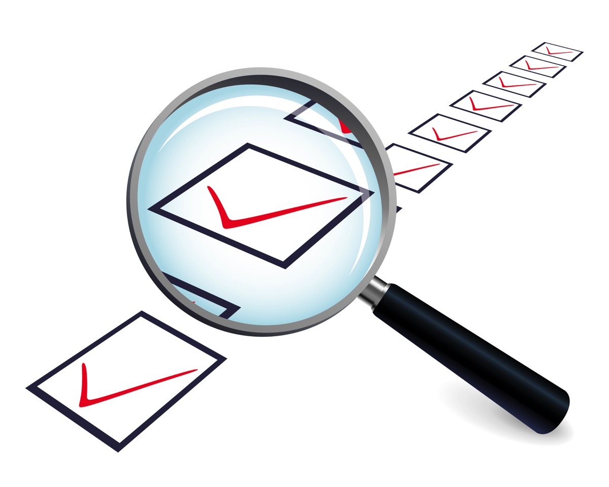 Magnifying glass depicting inspection and assessment